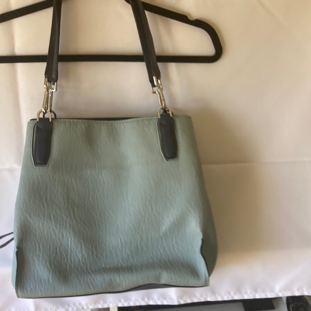 Calves Klein light and navy blue handbag